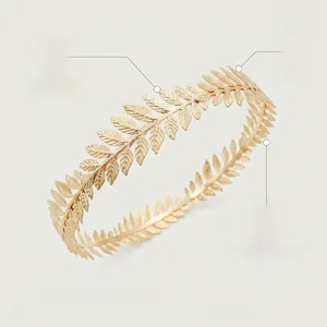 Macro detail showing high-quality alloy base and fine gold plating on the laurel crown
