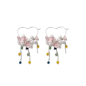 Dopamine style heart hoop earrings featuring pink flowers, pearls and crystal tassels