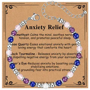 Detailed view of 4mm crystal beaded bracelet with silver lobster clasp and heart charm