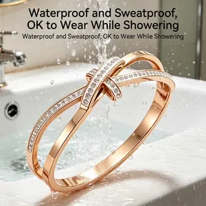 Waterproof rose gold bow knot titanium steel bracelet featuring pave stones in splash