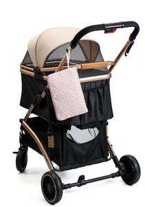 Macro detail of the rose gold metal frame and durable fabric of this pet stroller
