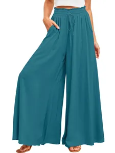 Detailansicht der blauen Weitbeinhose mit Kordelzug und hohem Bund aus Baumwolle