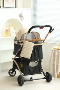 Detail of the champagne gold stroller frame and a quilted storage bag on the handle