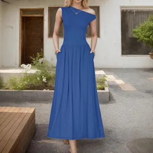 Elegant royal blue sleeveless maxi dress with one-shoulder neckline and pockets