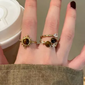 Retro golden sunflower tiger eye rings set for women worn in a bohemian style
