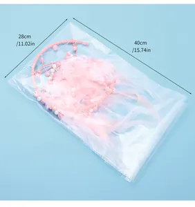 Pink moon dream catcher with feathers in clear packaging, dimensions 28x40 cm