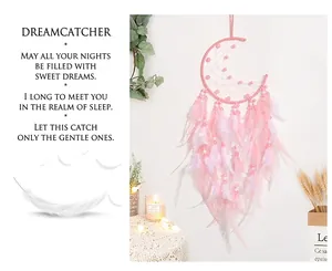 Macro detail of moon-shaped pink dream catcher with soft feathers and pearls