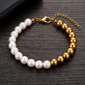Detail view of the 8mm glass pearl and gold stainless steel bead spliced bracelet