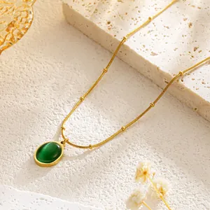 Elegant gold titanium steel necklace with an oval green cat eye stone pendant