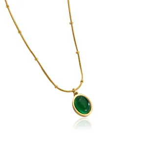 Elegant gold titanium steel necklace with green oval stone and beaded snake chain