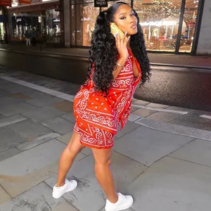Close-up of red bandana paisley print two-piece shirt and shorts set for women