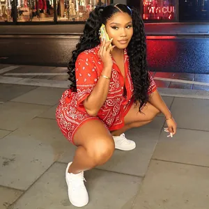 Close-up of red two-piece casual set featuring intricate white paisley bandana prints