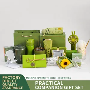 Green business gift set including thermal coffee cup, water bottle, umbrella, and mini fan