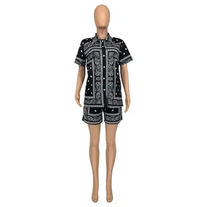 Detail of classic black and white paisley print on two-piece short sleeve summer set