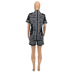 Detail of paisley print shorts and short sleeve shirt back view on a mannequin