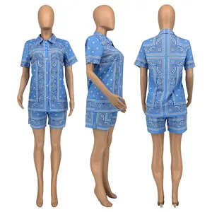 Three-way view of blue paisley print short sleeve shirt and shorts set on mannequins
