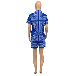 Rear view of women's blue paisley print two-piece set with shirt and shorts