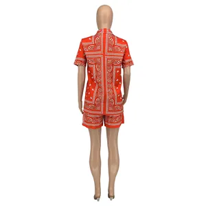 Rear view of red and white paisley print two-piece set featuring shirt and shorts