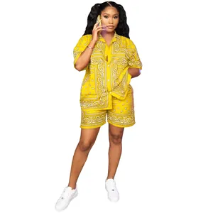 Women's yellow two-piece casual set featuring a vibrant white paisley bandana print