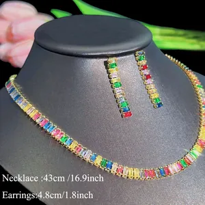 Detail of rainbow baguette gemstone necklace and earrings set with dimensions labeled