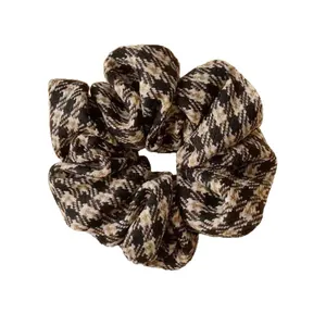 Classic houndstooth fabric scrunchie with high elasticity for elegant hair styling