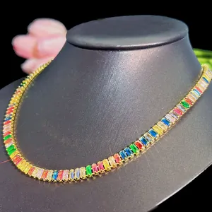 Detailed close-up of a rainbow zircon tennis necklace on a professional black bust display
