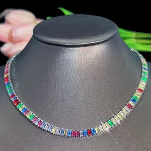 Detailed macro view of vibrant rainbow tennis necklace with rectangular-cut gemstones