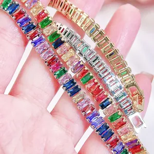 Close-up of baguette-cut colorful zircon tennis bracelets set on a woman's wrist