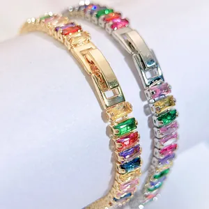 Detailed view of rainbow rectangle zircon tennis bracelets in gold and silver finish