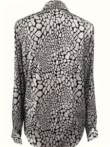 Elegant women's long sleeve slim fit shirt featuring bold black and white animal print