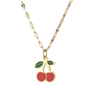 Sweet cherry pendant necklace in gold finish with red fruit and green leaves detail