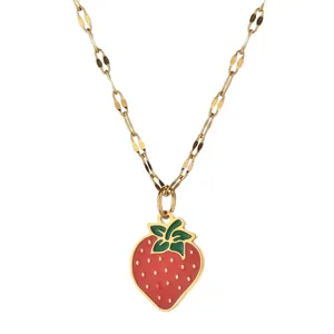 Gold-tone chain necklace featuring a vibrant red strawberry pendant with green leaves