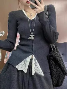 Slim fit dark grey knit cardigan with white lace trim and elegant V-neck design