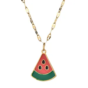 Detailed view of watermelon slice pendant with gold-tone chain and enamel finish