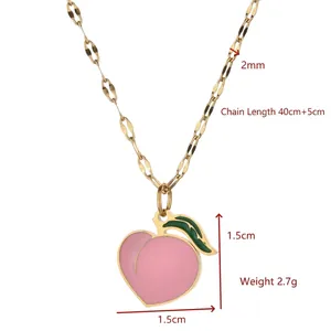 Gold-tone necklace with a pink peach pendant and green leaf detail for women
