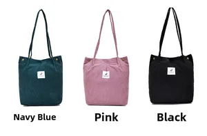 Three corduroy tote bags in navy pink and black colors with stylish side snap buttons