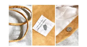 Macro details of yellow corduroy tote bag showing magnetic buckle and fabric label