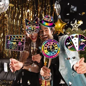 Vibrant 2027 New Year's Eve party photo props held by people in a festive celebration