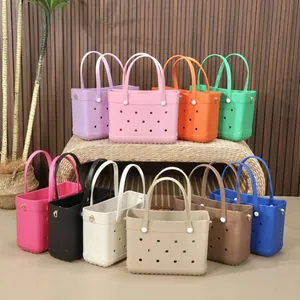 Detailed view of colorful lightweight EVA beach tote bags with DIY holes