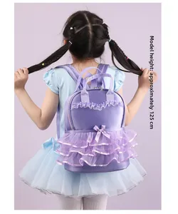 Detailed back view of a purple ruffled girl's dance backpack worn by a young child model