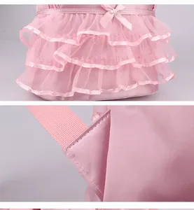 Detailed macro view of pink dance backpack featuring tiered lace ruffles and satin bow
