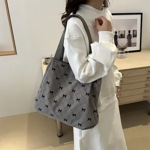 Large capacity gray corduroy tote bag featuring black bow patterns and diamond quilting