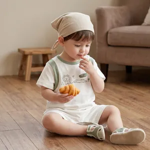Barboteuse bébé à manches courtes en tissu doux et élastique avec imprimé lion mignon