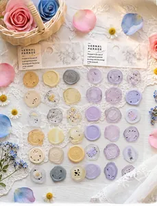 Detailed view of semi-transparent faux wax seal stickers featuring various floral patterns