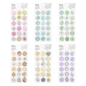 Translucent wax seal stickers set with delicate floral and botanic patterns for scrapbooking