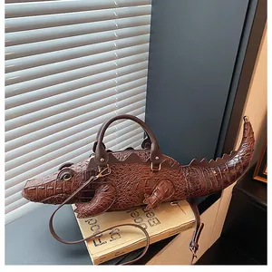 Unique 3D crocodile-shaped handbag with textured brown finish and crossbody strap