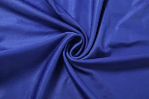 Gros plan macro de la texture du tissu en maille côtelée bleue pour robe femme