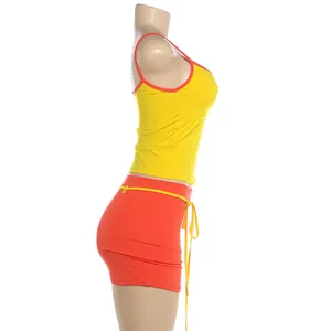 Ensemble débardeur jaune vif et mini-jupe moulante orange pour femme vue détail
