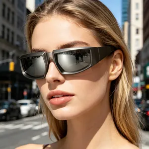 Detailed view of stylish steampunk UV protection sunglasses on a female model in city
