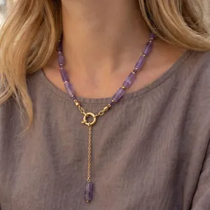 Elegant purple amethyst beaded Y-shaped lariat necklace with gold circular spring clasp.